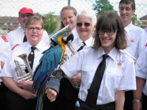 Beth and others with Macaw